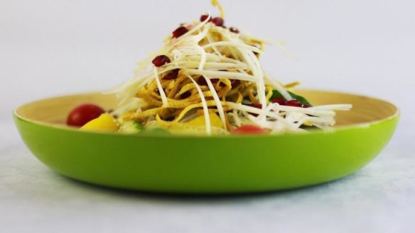 The Energy Bliss salad is powered by papaya, pomegranate and creamy coconut dressing. 