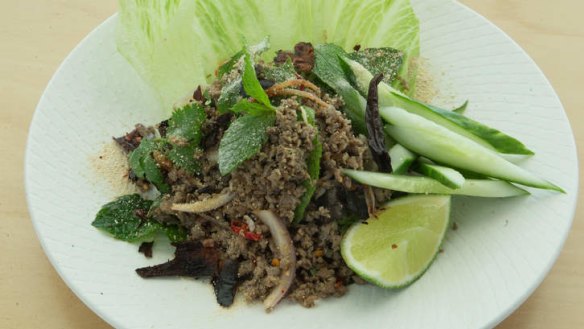 Duck larb has a slow-burn heat.