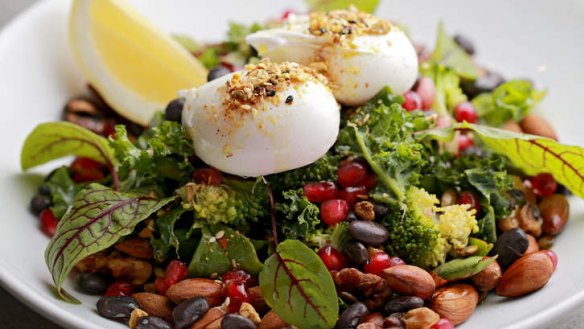 Poached eggs perched on the breaky greens salad.