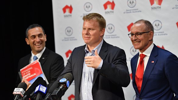 SA Labor MP Tom Koutsantonis, left, Sonnen Australia managing director Chris Parratt, and SA Premier Jay Weatherill on Thursday.