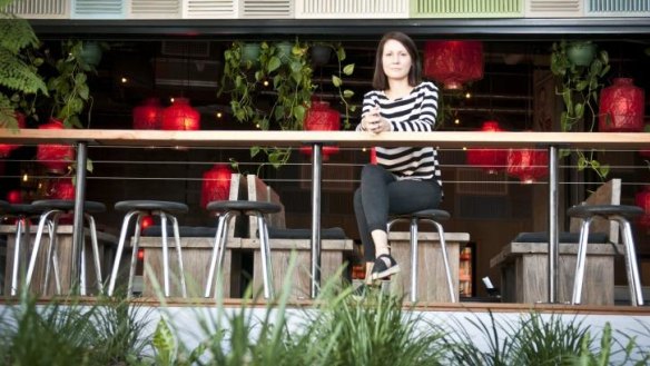 Owner Anna Demirbek outside Uncle Ho's.