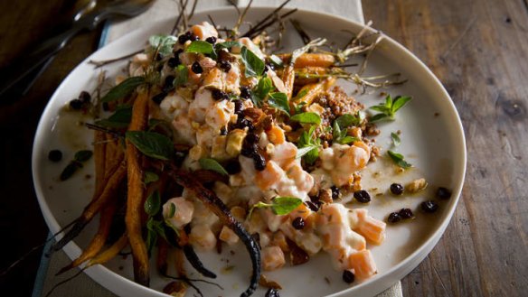 Carrot and red quinoa salad with oregano, smoked almonds, currants and roasted garlic dressing.