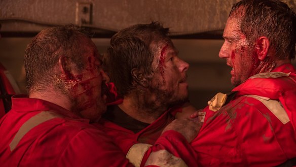 Mark Wahlberg plays electronics technician Mike Williams (centre) with an air of dogged dependability in <i>Deepwater Horizon</i>.