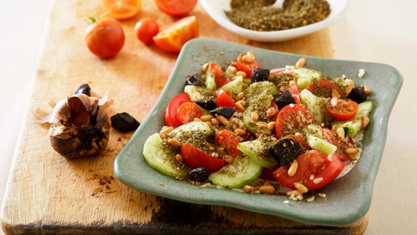 Sensational salad: Tomatoes, pickles, za'atar and yoghurt-tahini dressing.