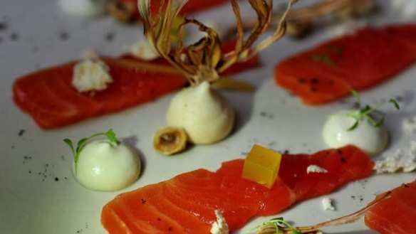 Cured ocean trout ... Horseradish meringue, fennel, charred leek and hazelnut.