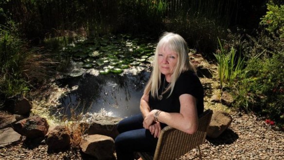 Pondering: Several varieties of frogs live in Fiona MacGregor's pond  in Oaks Estate.