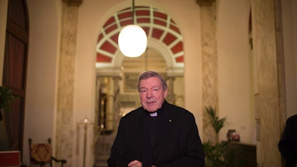 Cardinal George Pell talks to the press after giving evidence to the Royal Commission into Institutional Responses to Child Sexual Abuse in March 2016.