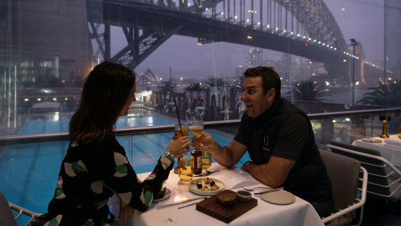 Chris Yates with his wife Marta celebrate their 11th Wedding anniversary at Aqua Dining at Milsons Point as trading resumes for restaurants.