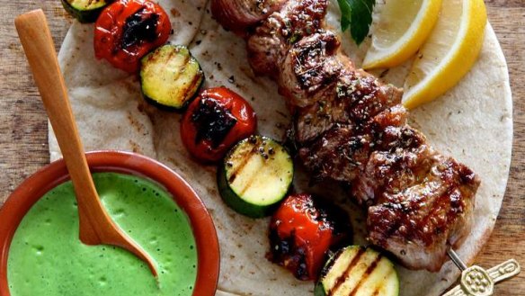 Lamb skewers with green tahini.