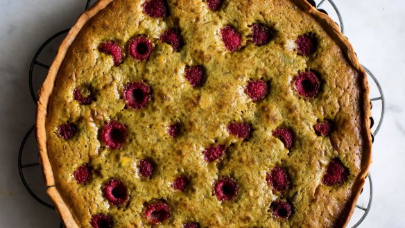 The crushed pistachio filling gives this tart a green tinge.