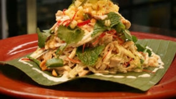 Coconut-grilled chicken with green mango salad and chilli jam