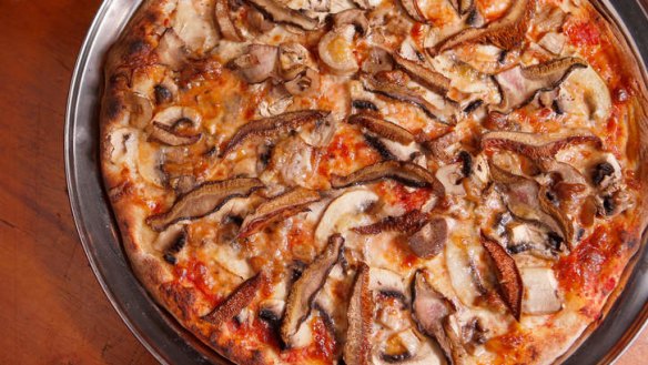 A fungi-scattered  pizza special.