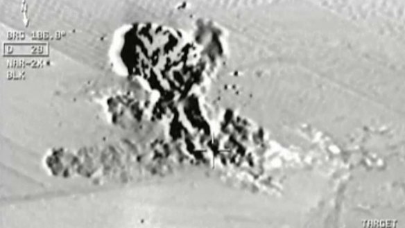 An image from an aircraft cockpit video released by Turkey's state-run agency Anadolu on Friday showing Turkish warplanes striking Islamic State group targets across the border in Syria. 