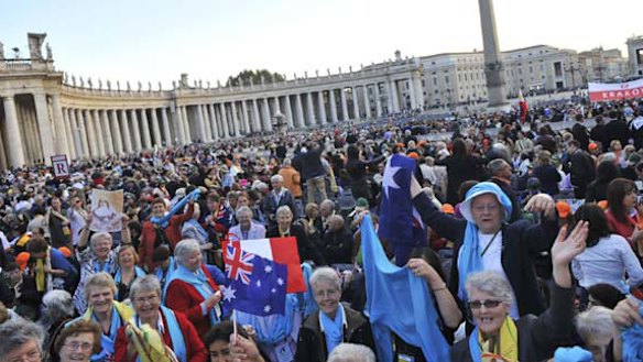 The colourful and exuberant Australian contingent among the 50, 000 people gathered in St Peter's Square yesterday. Mary MacKillop was one of six saints canonised.