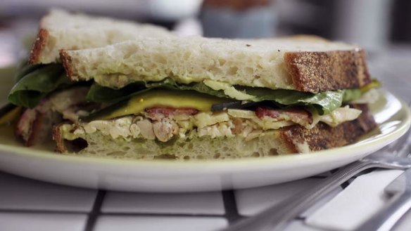 Coriander aioli and pickled zucchini liven up the club sandwich.