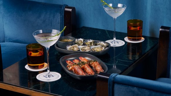 Pearl martinis, salt-roasted split prawns with charred lime and chilli, and oysters with gin, apple and river mint vinaigrette at Hickson House.