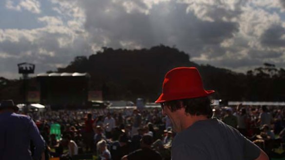 An evening descends on a perfect spring day with Hanging Rock as the backdrop, a crowd of 12, 000 awaits Canadian singer-poet Leonard Cohen.