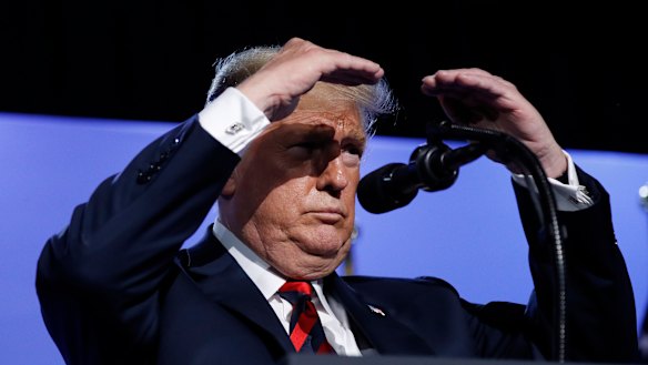 Seeing increases everywhere: US President Donald Trump shield his eyes from stage lights as he take questions from members of the media during a news conference before departing the NATO Summit in Brussels.
