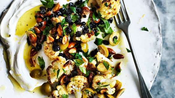 Warm salad of roast cauliflower, labna, olives and almonds.