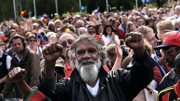  Reg Edwards raises his fists in triumph at Rudd's speech. 