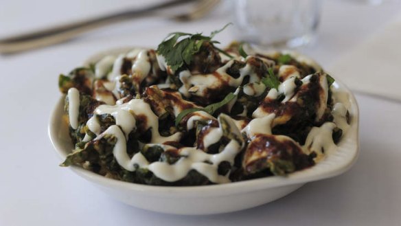 Copper Chimney's palak papdi chaat (spinach leaves in a crispy lentil butter, topped with yoghurt, date and tamarind, chilli and mint sauces).