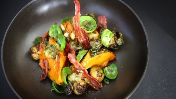 Roasted pumpkin with streaky bacon and brussels sprouts.
