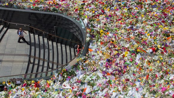 Thousands of floral tributes were placed in Martin Place for victims Tori Johnson and Katrina Dawson