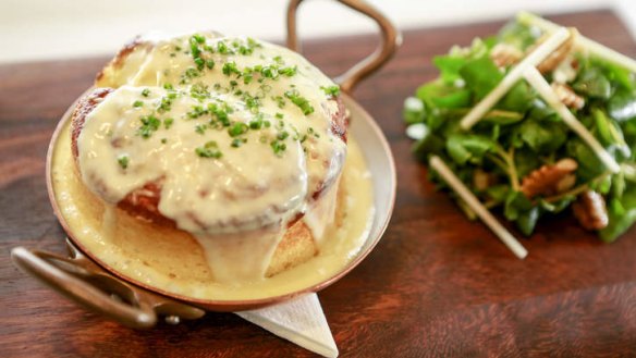 Intensely cheesy: Souffle with roquefort sauce.