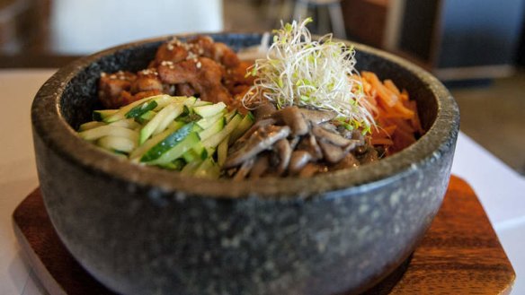 Sizzling: Bibimbap with spicy chicken.