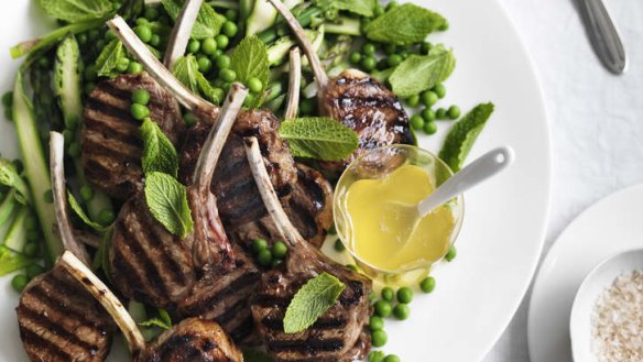 Barbecued lamb cutlets with mint sauce.