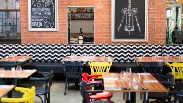 Colourful bistro chairs add pop to the Fish Lane Bistro dining area.