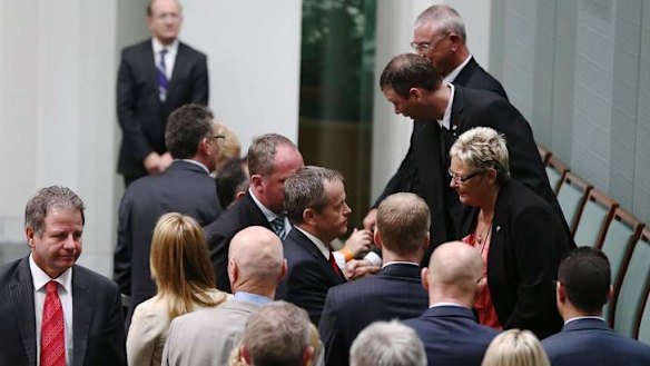 MPs greet the family of Corporal Cameron Baird VC MG. Photo: Alex Ellinghausen