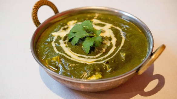 Palak paneer: cubes of paneer cheese in spiced spinach puree.