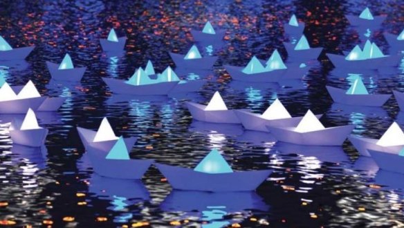 300 illuminated paper boats will float on the lake during Enlighten.