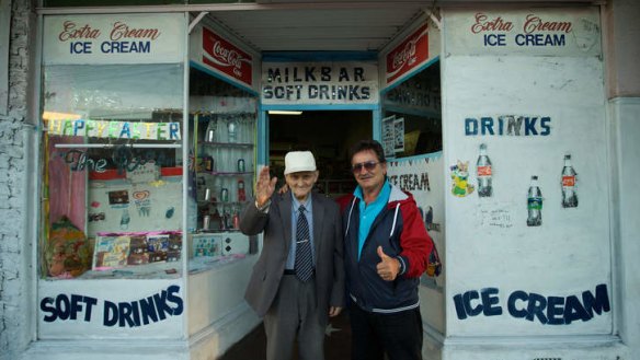 George Poulos, 90, with his son Nik, has owned the Rio milk bar in Summer Hill since 1952.