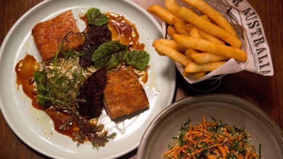 Pork belly for two, with raw carrot side and chips.