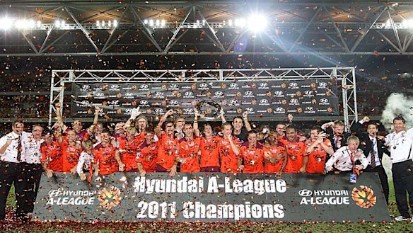 The Roar celebrate victory during the A-League grand final.
