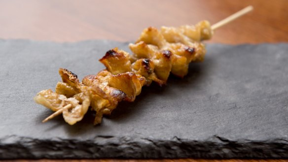 Binchotan is ideal for grilling yakitori like this chicken skin skewer at Bird's Nest, Brisbane.