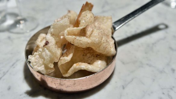Crackling, chicken skin and puffed tendon.