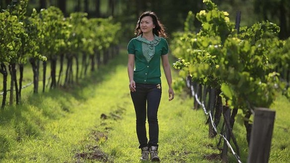 Glass full &#8230; Wynwood Estate's executive director, Michelle Jin. Wynwood is one of three wineries bought by the China-based Winston Wines, which is keen to export reds.