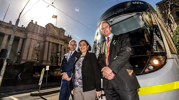 Energy Minister Lily D'Ambrosio with PTV chief executive Jeroen Weimar  (left) and Yarra Trams executive director Rob Robson.