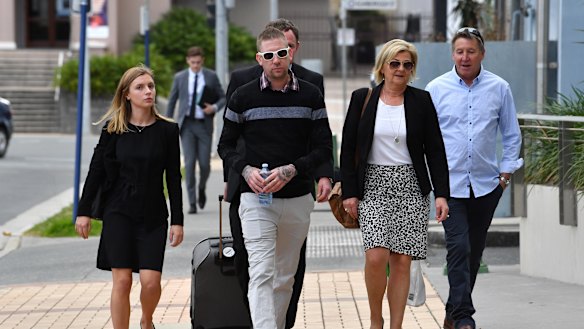 Kate Goodchild's husband Dave Turner (centre) and her father Shane Goodchild arrive for the inquest.