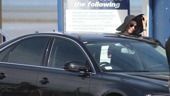 Angelina Jolie leaves a water taxi at Cleveland.