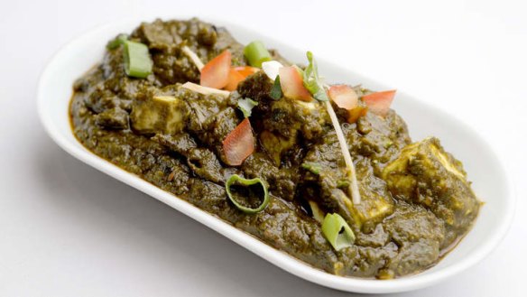 Palak paneer - cubes of fresh cheese swimming in spinach puree.