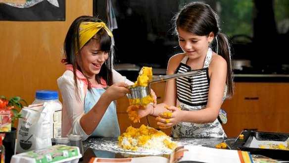 Saskia and Stella Levin get busy with pumpkin gnocchi.