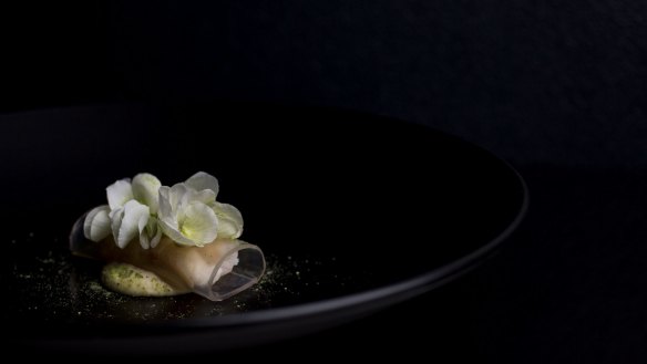 Spanner crab, sake vinegar jelly, brown butter emulsion, pea flower and horseradish served at Sepia.