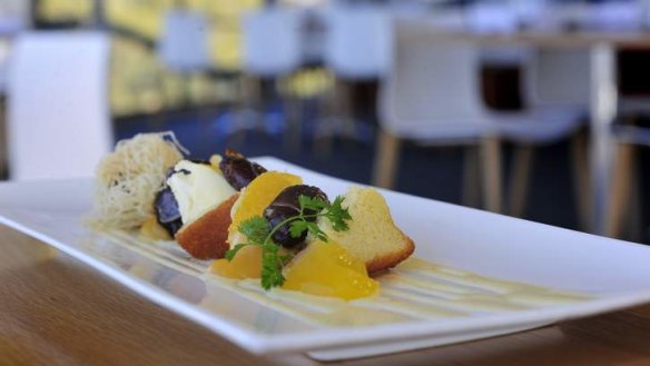 Deconstructed trifle of olive oil sponge, anglaise, mandarin puree, orange jelly, poached date and pistachio kataifi pastry balls at Onred.