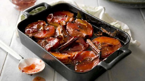 Slow-roasted quinces with honey, cinnamon and cloves.
