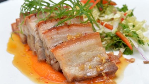 Roast pork belly with carrot puree and spiced honey glaze.