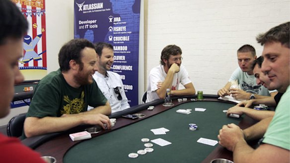 The Atlassian team enjoy a break from the daily grind at their poker table.